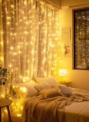 Brightown 300 LED Fairy Curtain Lights, 9.8ft x 9.8ft Curtain String Lights | Warm White USB Plug in 8 Lighting Modes Christmas String Hanging Lights with Remote for Bedroom Indoor Outdoor Party Xmas