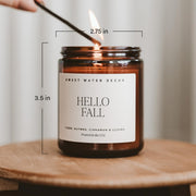Sweet Water Decor Hello Fall Candle, 9oz Amber Jar, Autumn Scents for Home | Hot Cider, Cinnamon, Cloves, & Nutmeg Soy Wax Scent Notes, 40+ Hour Burn Time, Glass Jar, Black Lid, Thanksgiving & Halloween