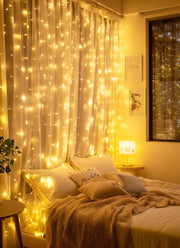 Brightown 300 LED Fairy Curtain Lights, 9.8ft x 9.8ft Curtain String Lights | Warm White USB Plug in 8 Lighting Modes Christmas String Hanging Lights with Remote for Bedroom Indoor Outdoor Party Xmas