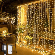 JMEXSUSS 300 LED Remote Control Curtain Lights, Plug in Fairy Curtain Lights Outdoor, Window Wall Hanging String Lights for Bedroom Indoor Dorm Backdrop Wedding Party Patio Christmas Decor, Warm White