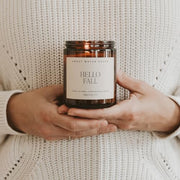 Sweet Water Decor Hello Fall Candle, 9oz Amber Jar, Autumn Scents for Home | Hot Cider, Cinnamon, Cloves, & Nutmeg Soy Wax Scent Notes, 40+ Hour Burn Time, Glass Jar, Black Lid, Thanksgiving & Halloween