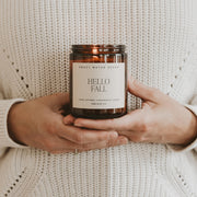 Sweet Water Decor Hello Fall Candle, 9oz Amber Jar, Autumn Scents for Home | Hot Cider, Cinnamon, Cloves, & Nutmeg Soy Wax Scent Notes, 40+ Hour Burn Time, Glass Jar, Black Lid, Thanksgiving & Halloween